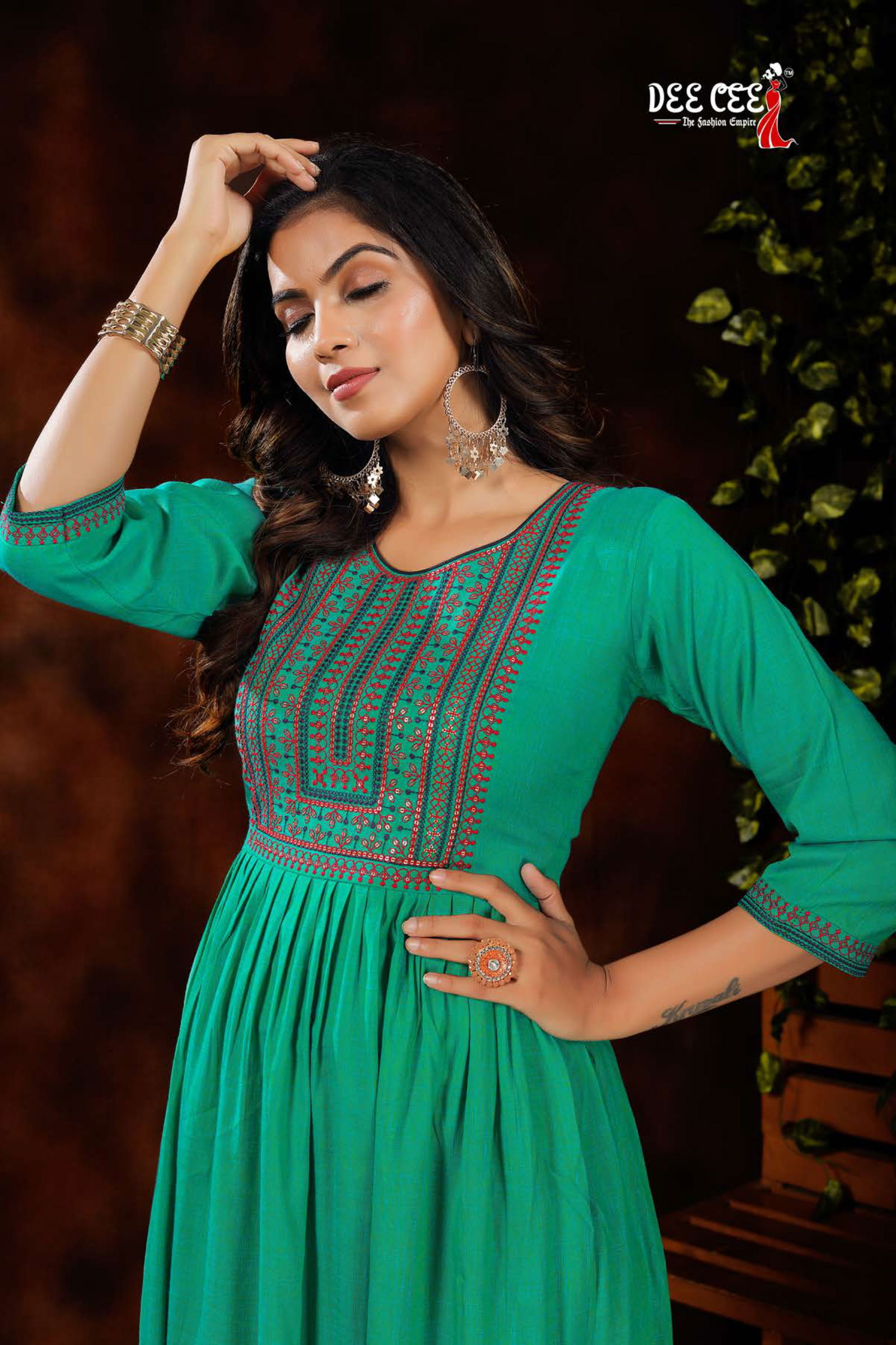 Dee Cee Orange Rayon Fancy Wear Designer Latest Kurtis Collection